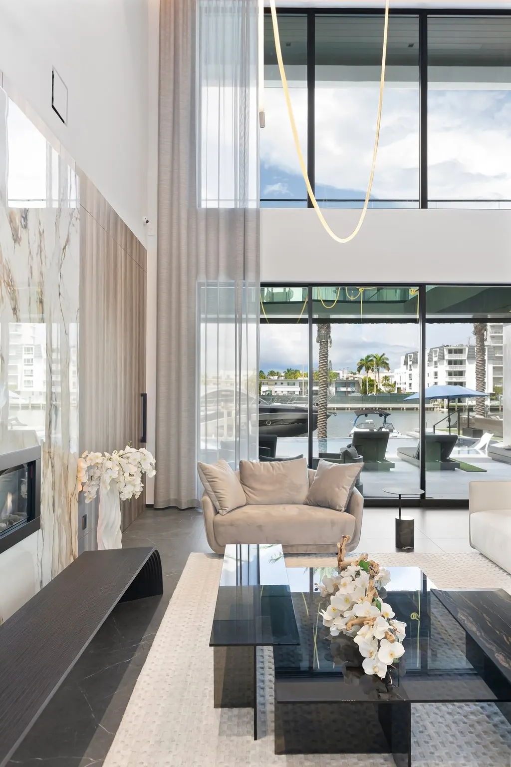 sheer curtains in living room with waterway view, Bal Harbour