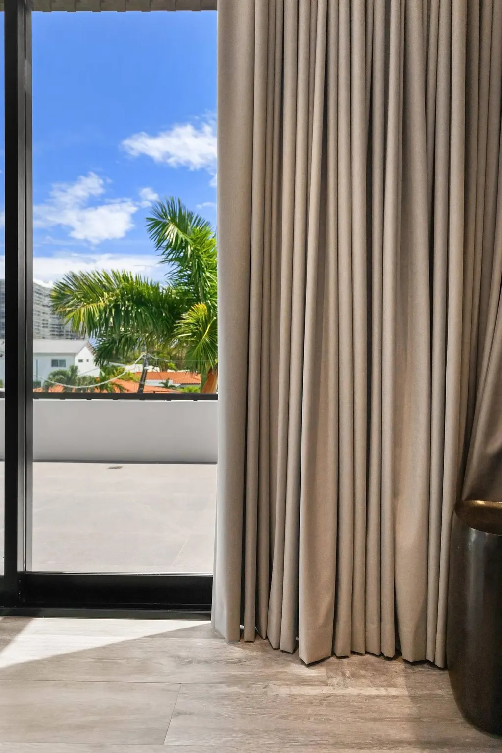 blackout drapery at terrace door in bedroom, Bal Harbour